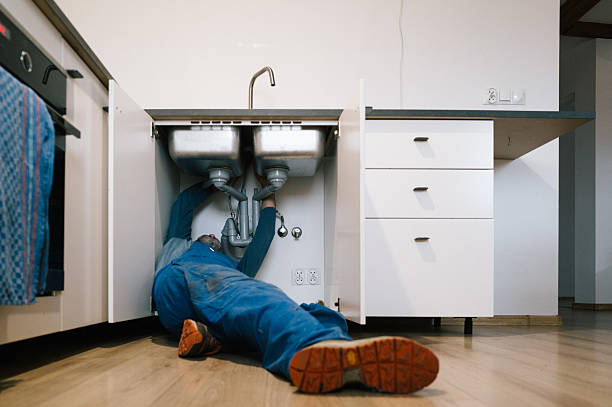 Professional Plumbing technician working in Lake City, TN